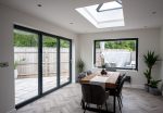 The interior of a Swindon home with aluminium bifold doors.